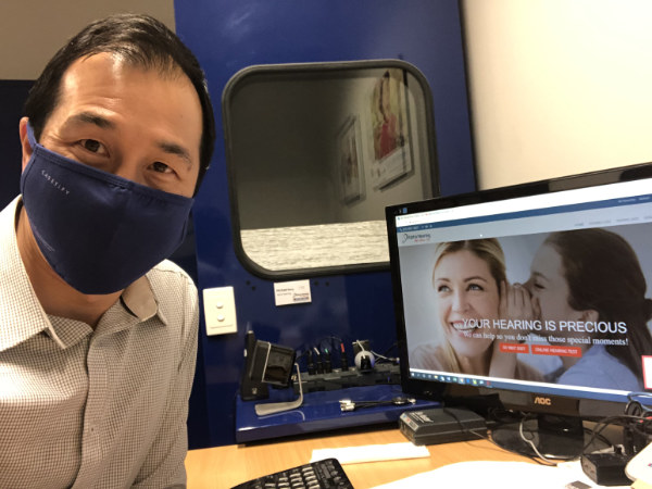 wearing face mask Michael Wong Clinic