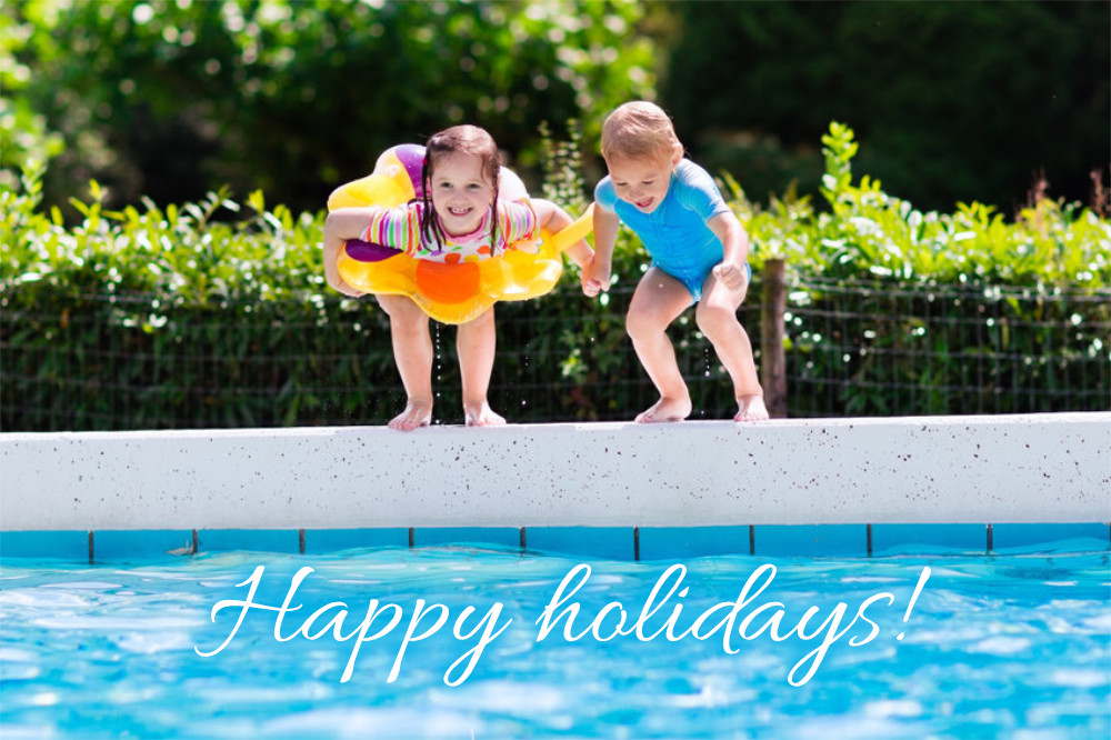 happy holidays kids jumping in pool